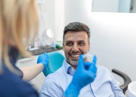 Man smiling in the dental chair