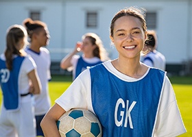 Patient in Irving smiling with Invisalign Teen